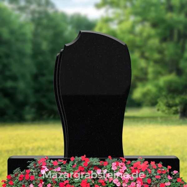 Islamischer Grabstein mit arabischer Kalligraphie und traditionellen Symbolen